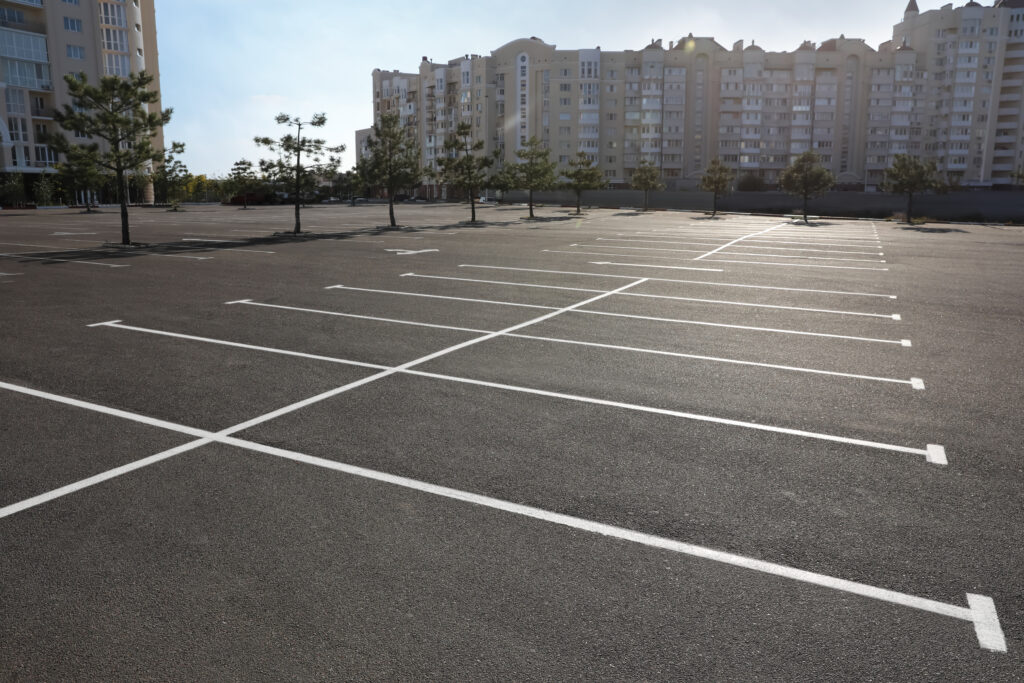 car parking lot with white marking outdoors